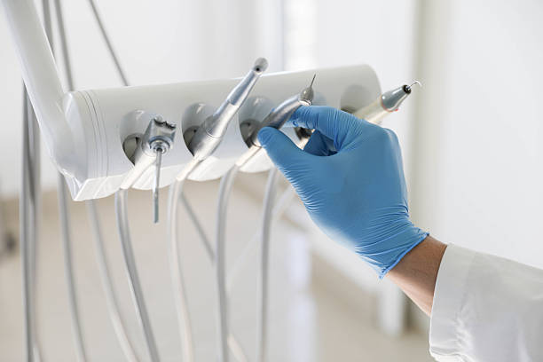 Professional Tooth Extraction technician working in Sinton, TX